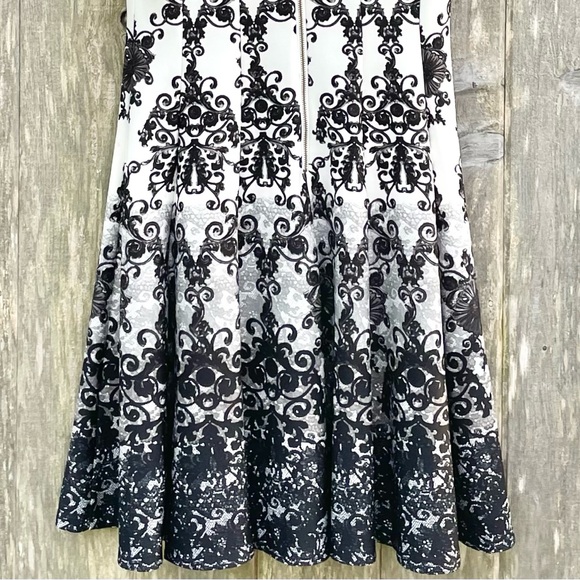 NWOT Gabby Skye Black And White Pattern Bodycon Sleeveless Dress. Mid Length. 4 - Picture 9 of 13
